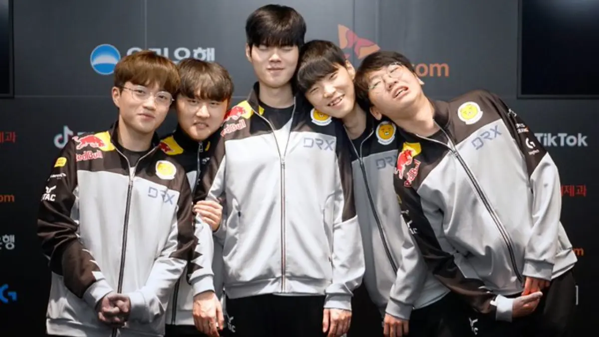 Esports team posing together in matching jackets