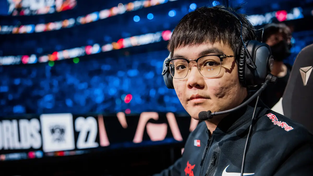 Esports player wearing headset at a championship arena