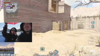 First-person shooter livestream with facecam and gameplay HUD