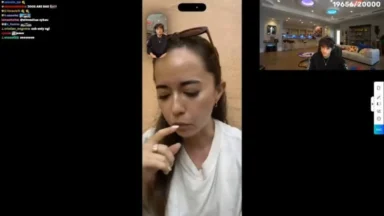 Woman on livestream with chat and streamer inset