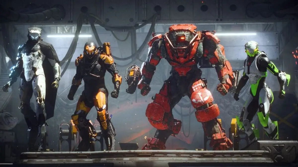 Four armored exosuits in futuristic environment