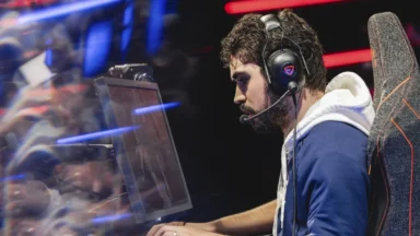 Esports player wearing headset at gaming computer