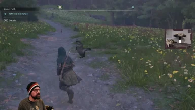Gamer chases creature on forest path, cat in corner.