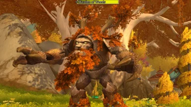 Tree creature with autumn leaves in fantasy forest
