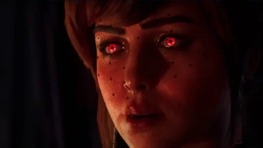 Close-up of character with glowing red eyes.