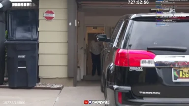 Black SUV parked in residential driveway