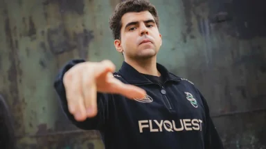Person wearing FlyQuest jacket posing confidently