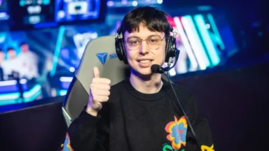 Gamer wearing headset giving thumbs up