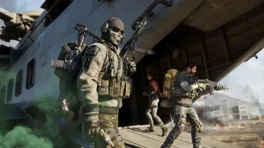 Armed soldiers exit a military transport helicopter