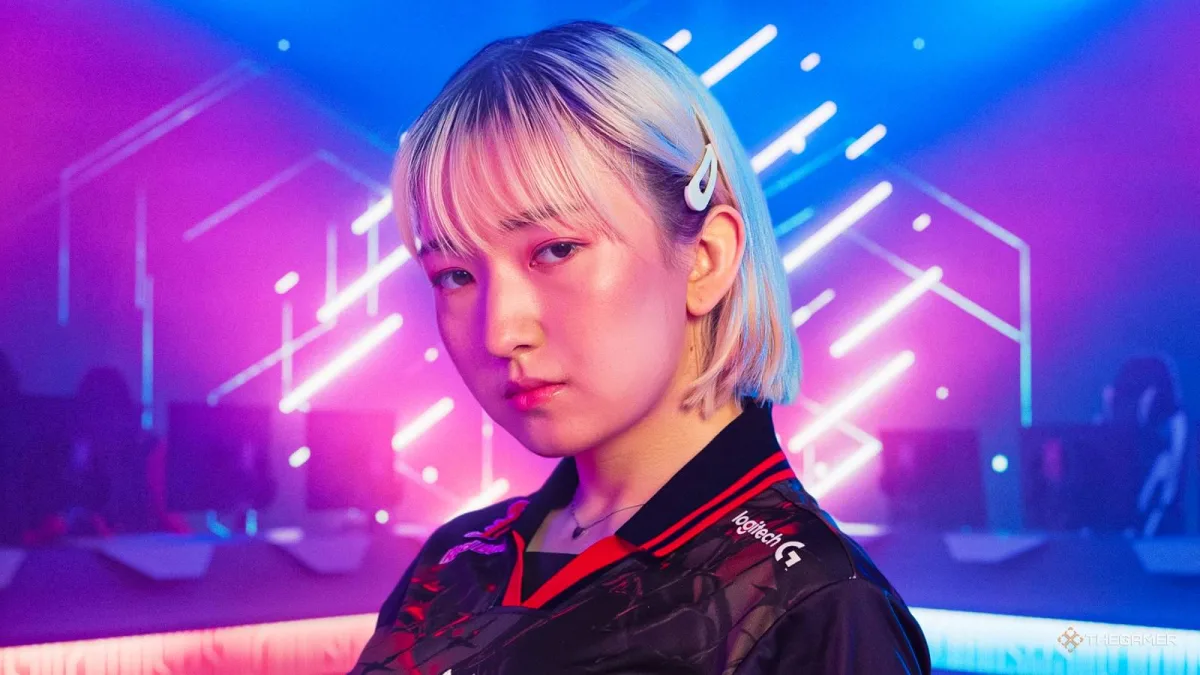 Gamer posing in neon-lit esports arena