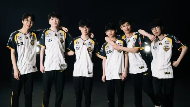 Esports team posing in matching jerseys.