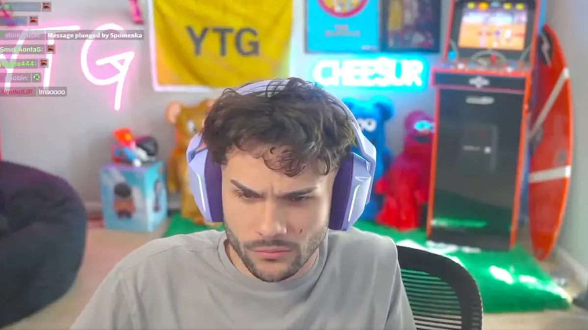 Man wearing headset in colorful gaming room