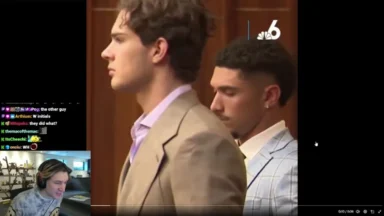 Two men in suits standing in courtroom