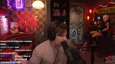 Streamer in studio with neon lights and decorations.