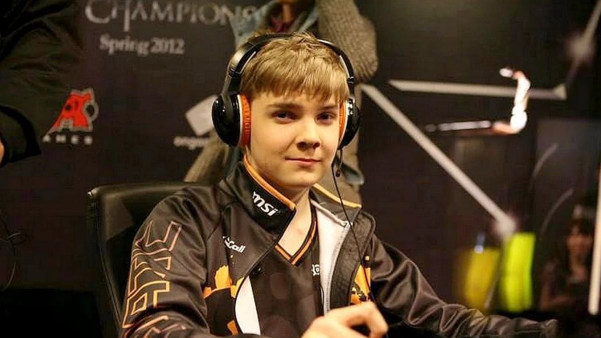 Young esports player wearing headphones at a 2012 tournament