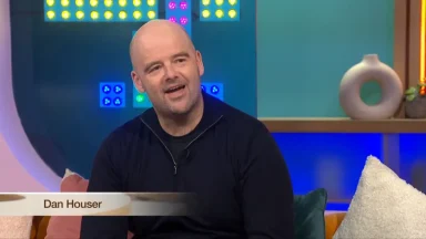 Person speaking during a television interview