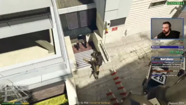 Motorcyclist jumps toward building entrance in Grand Theft Auto gameplay