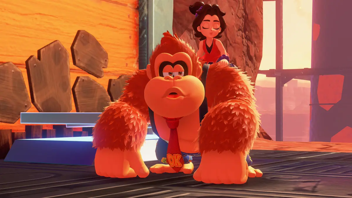donkey kong bananza Cartoon gorilla with woman on its back.