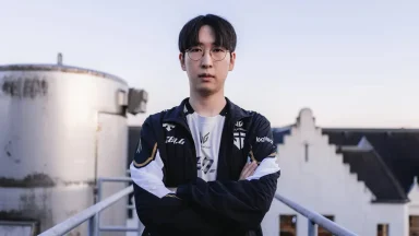 League of Legends Esports player posing outdoors in team jacket