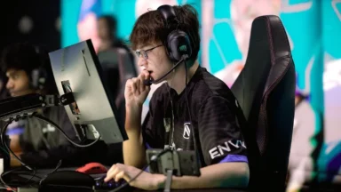 Esports player wearing headset at gaming tournament