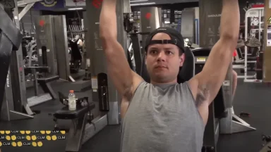 Man lifting weights at gym