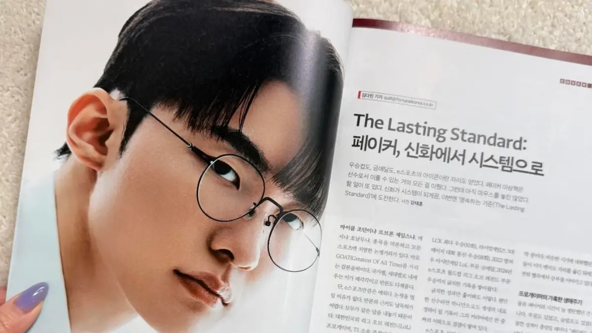 Magazine spread featuring man wearing round glasses