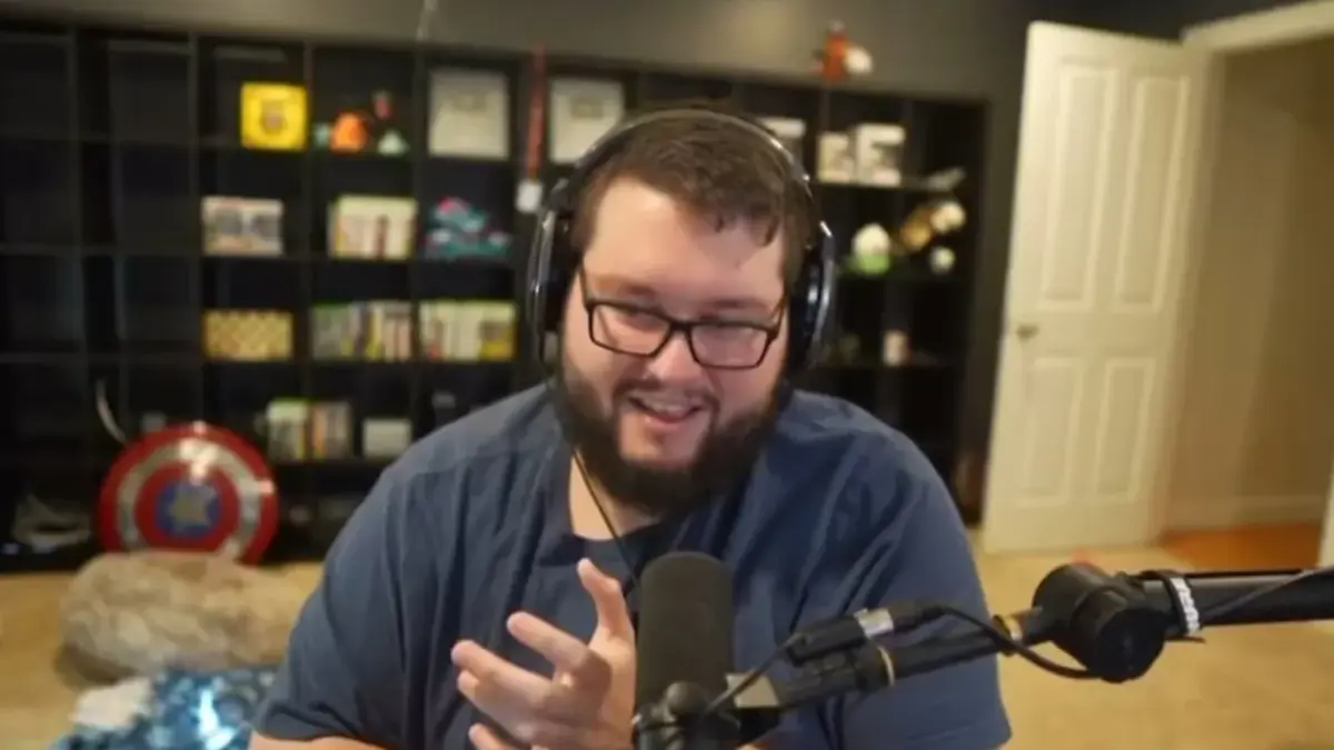 Man streaming with microphone and headphones