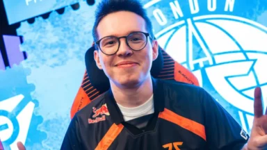 Smiling esports player in team jersey