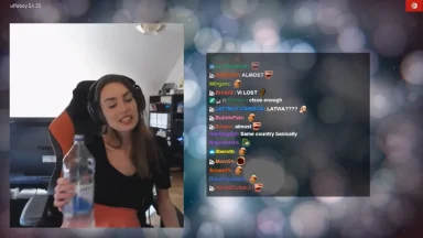 Streamer talking to chat while holding water bottle