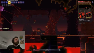 Terraria gameplay in a lava-filled cavern with streamer webcam