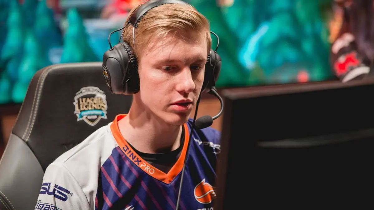 Esports player wearing headset during gaming tournament