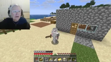 Woman streaming Minecraft gameplay with beach house build