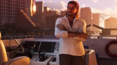 Man standing on yacht at sunset city skyline