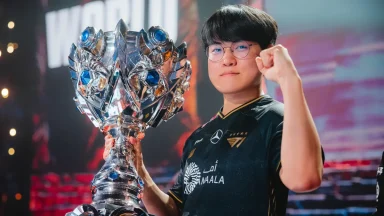 Esports player holding championship trophy