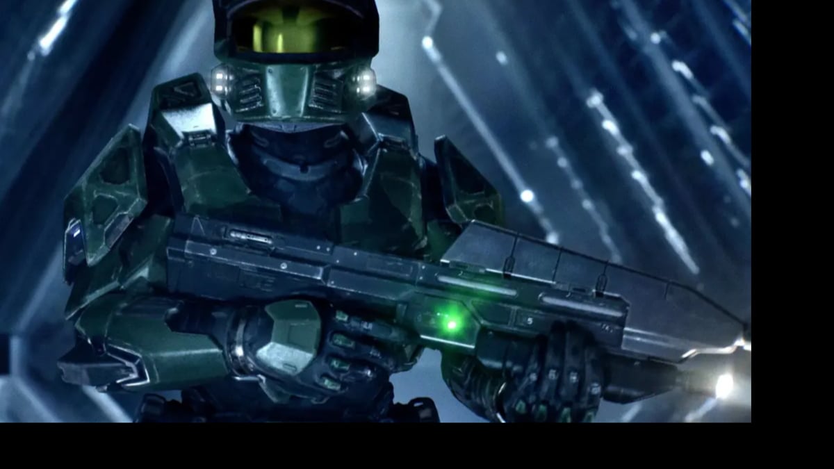 Futuristic armored soldier holding sci-fi rifle