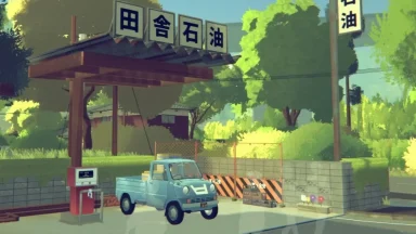 Small blue pickup at rural Japanese gas station