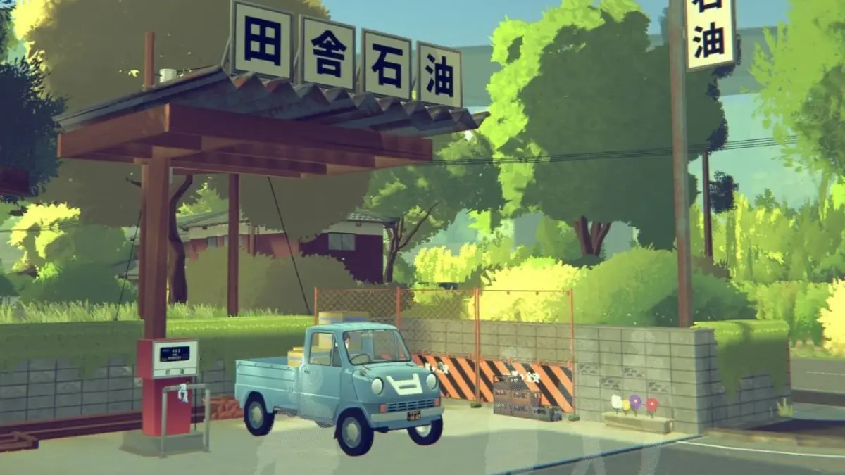 Small blue pickup at rural Japanese gas station