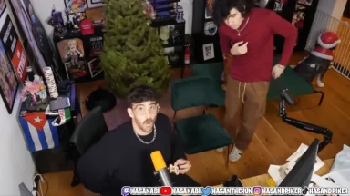 Two people streaming in a decorated room