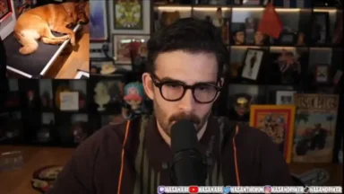 Man speaking into microphone with dog inset