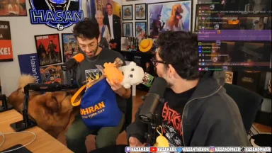 Podcast hosts discuss gifts with dog nearby