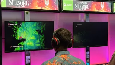 Person playing Hollow Knight: Silksong on Xbox.