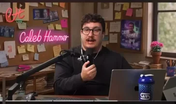 Man hosting a podcast in a studio setup