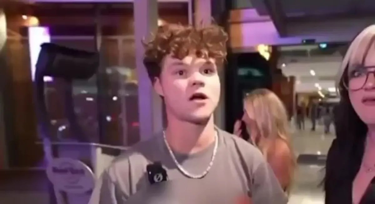 Young man surprised during night out interview