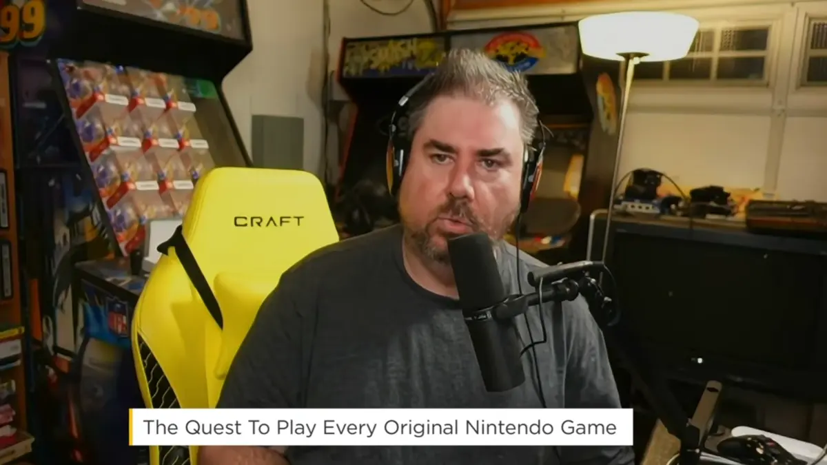 Man speaking into microphone in gaming room