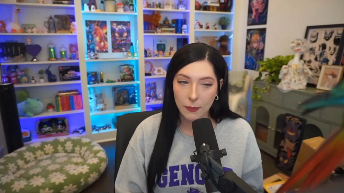 Woman speaking into microphone in colorful studio room