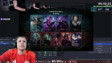 Gamer streaming fantasy game on computer setup