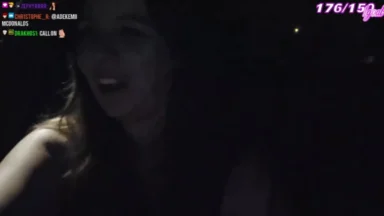 Woman streaming at night in low light