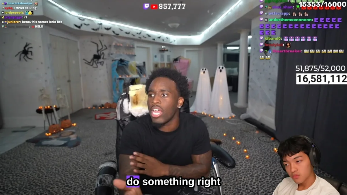 Two streamers in a Halloween-decorated room during livestream