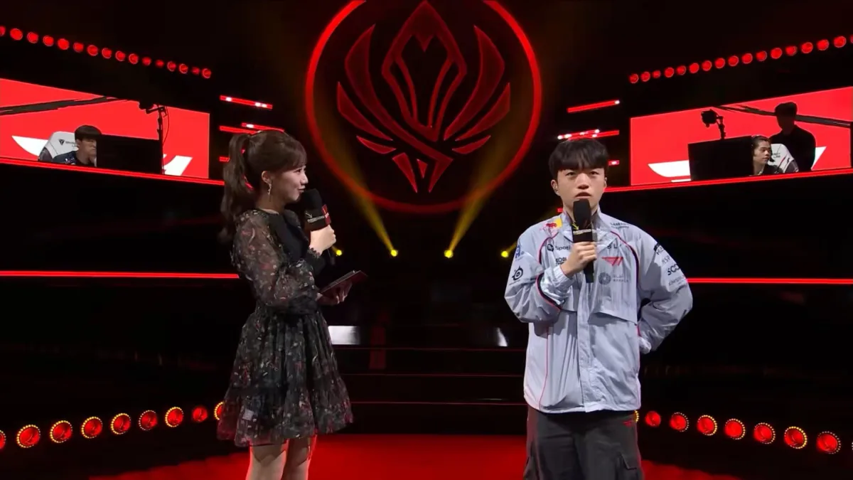 Esports player interviewed on red-lit stage