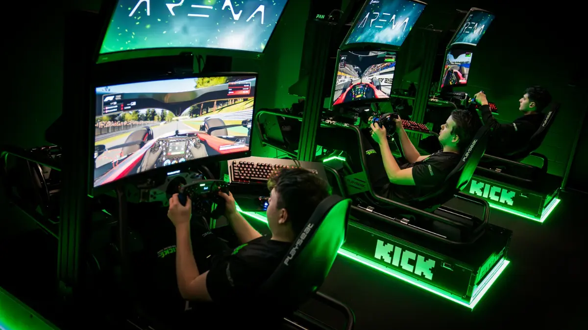 Gamers racing in advanced driving simulators